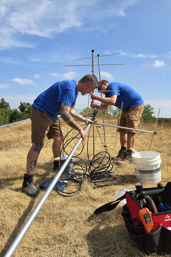Nathan and Kris helping with installation.jpg (257 KB)